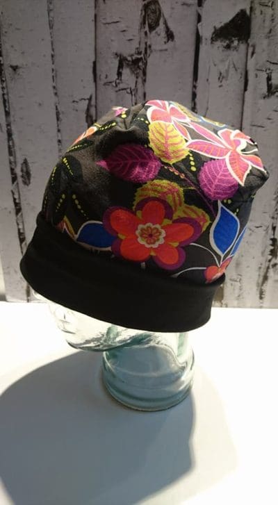 Blomster i skønne farver. Str. 54-62 cm