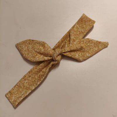 Hårbånd med guld "glimmer". Str 52-66 cm.